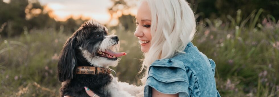Stephanie with her dog. Photo credit to Amy Lino Photography.