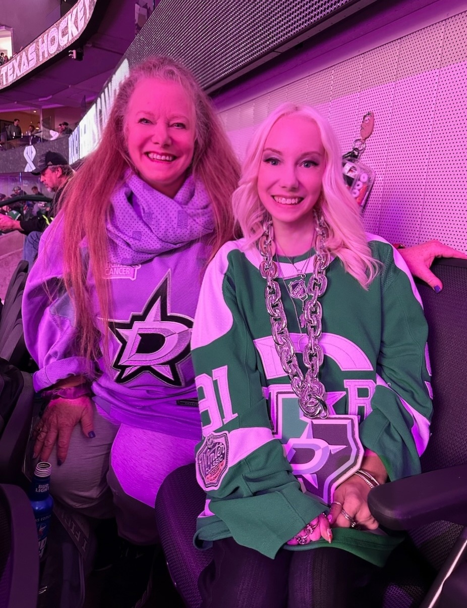 Attending a Dallas Stars Hockey Game with her mom